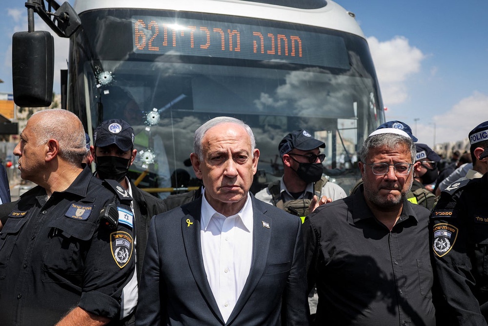 At least six killed and 12 injured after gunmen open fire at bus stop ...