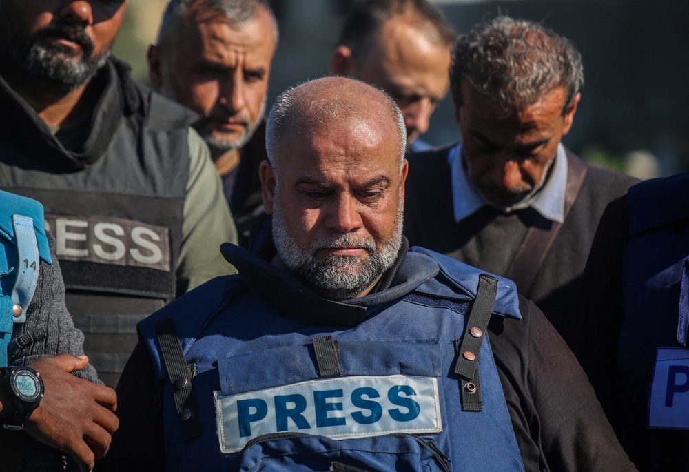 Family and friends including Al Jazeera reporter, Wael Al-Dahdouh, bid farewell to the bodies of journalists Hamza Al-Dahdouh and Mustafa Thuraya on January 7, 2024 in Rafah, Gaza (Getty)