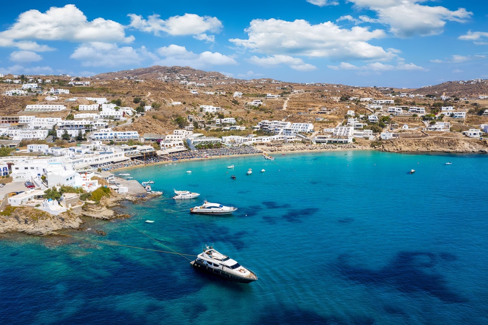 Platis Gialos beach is popular with both tourists and locals (Getty/iStock)