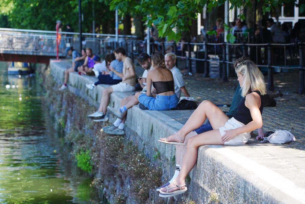 People in Bristol as the third heatwave of the summer hit the UK (Ben Birchall/PA) (PA Wire)