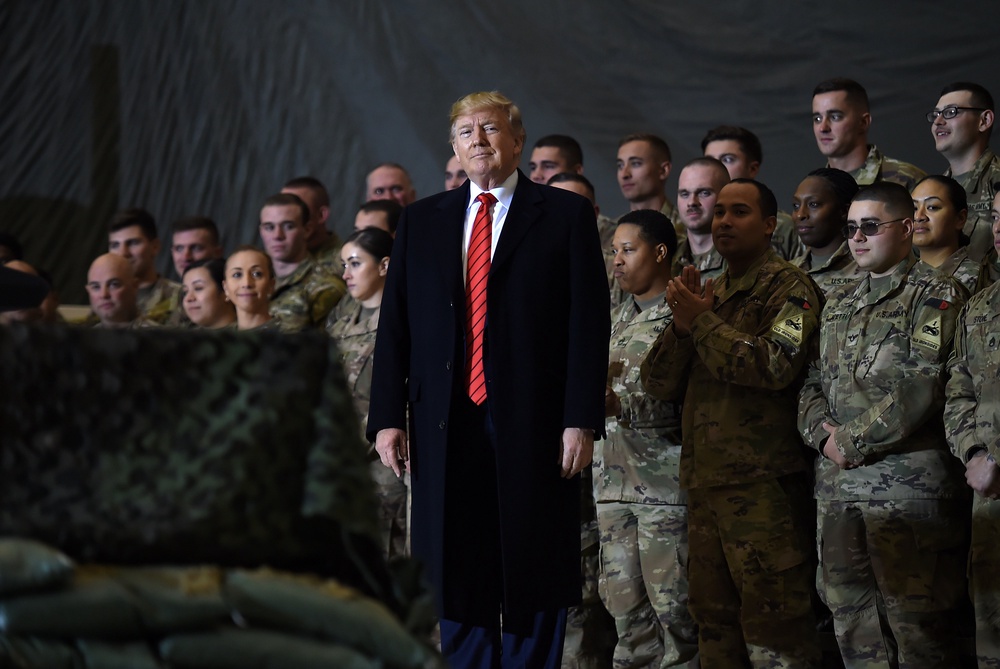 US President Donald Trump speaks to the troops during a surprise Thanksgiving Day visit at Bagram Air Field in 2019 (AFP via Getty)