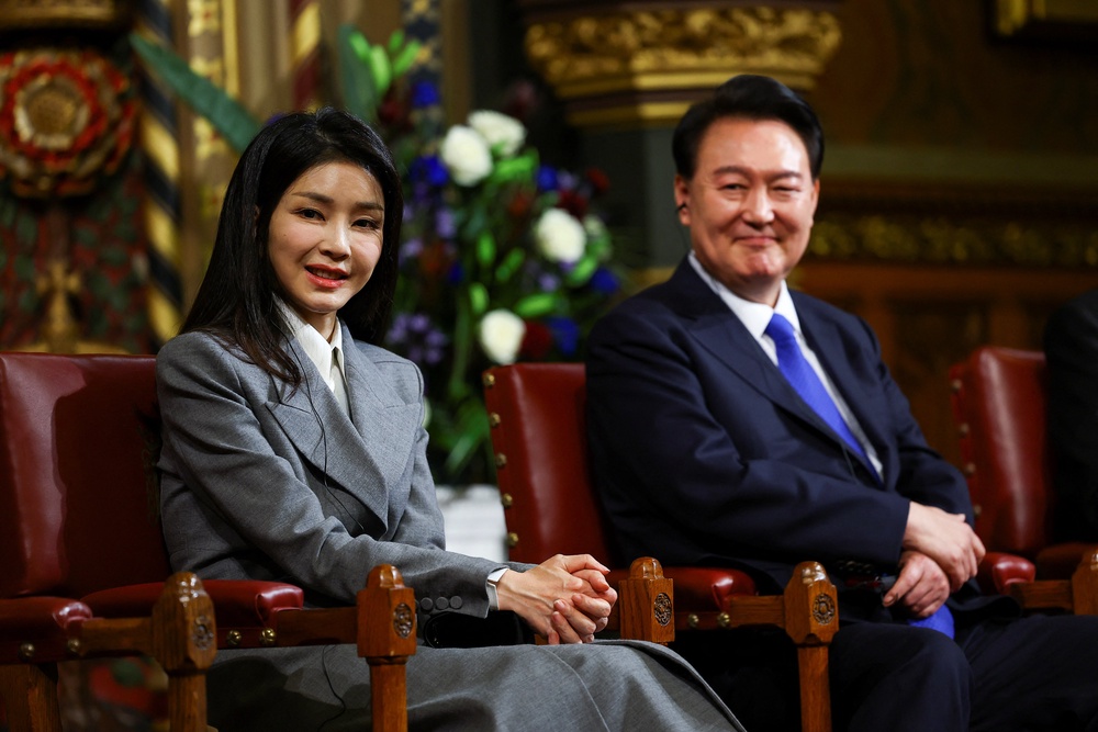 Former president Yoon Suk Yeol with his wife Kim Keon Hee visit the Palace of Westminster, UK, in 2023 (Getty)