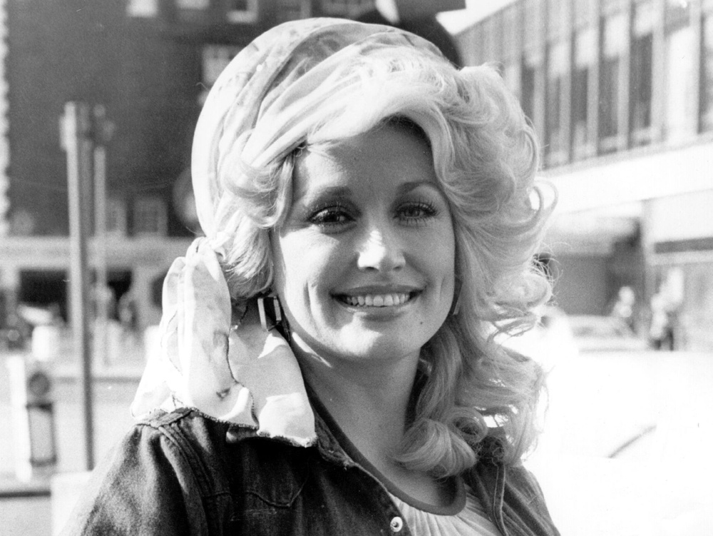 Dolly Parton photographed in London in 1977, the same year she released her first million-selling album ‘Here You Come Again’ (Getty)