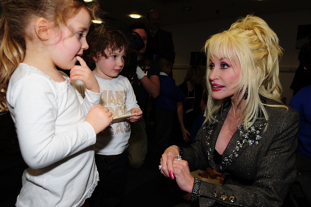 Dolly Parton, seen here launching her first Imagination Library’ in the UK in Rotherham in 2007, was a noted philanthropist (Getty Images)