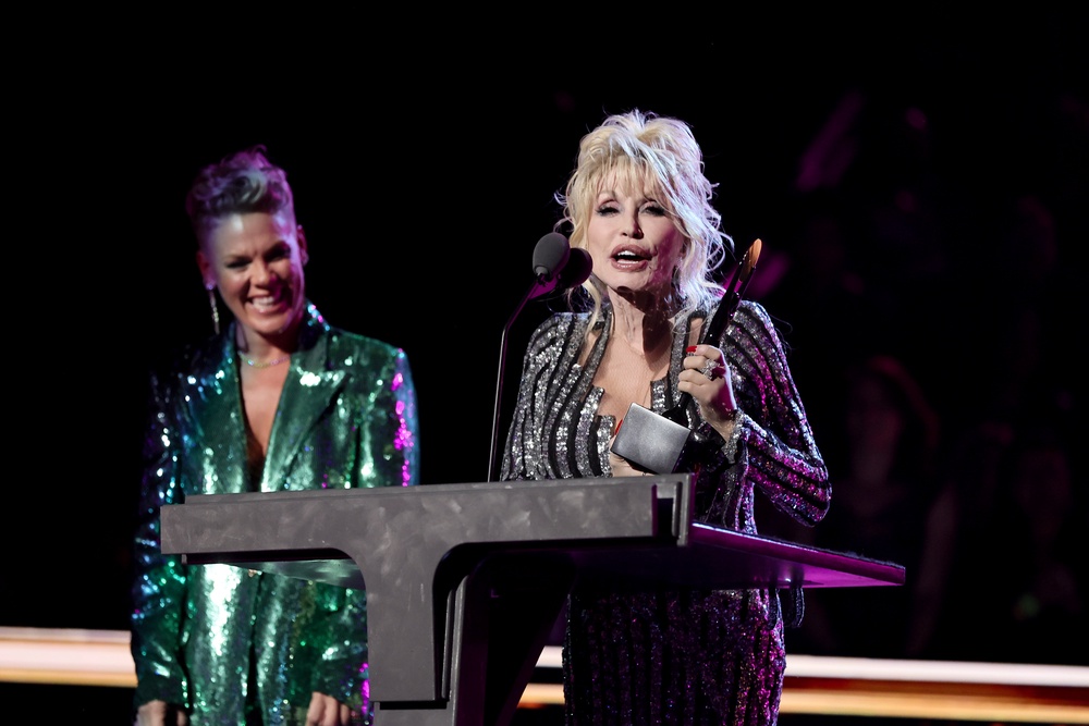 Dolly Parton with the singer Pink being inducted into the Rock & Roll Hall of Fame in November 2022, after initially turning the honor down. She later released a rock’n’roll album, 2023’s ‘Rockstar’ (Getty)