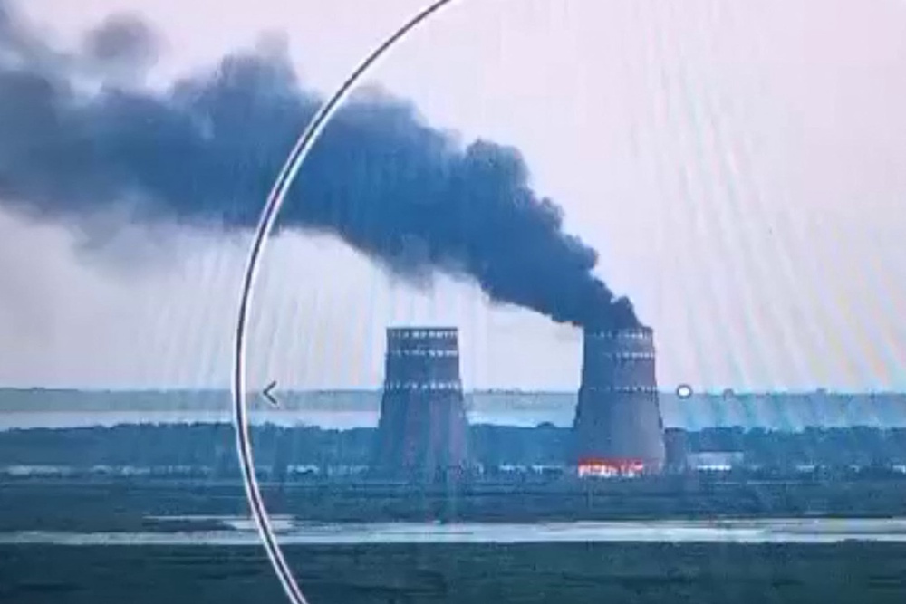 Fire at a cooling tower of the Russian-controlled Zaporizhzhia plant (Ukrainian Presidential Press Service)