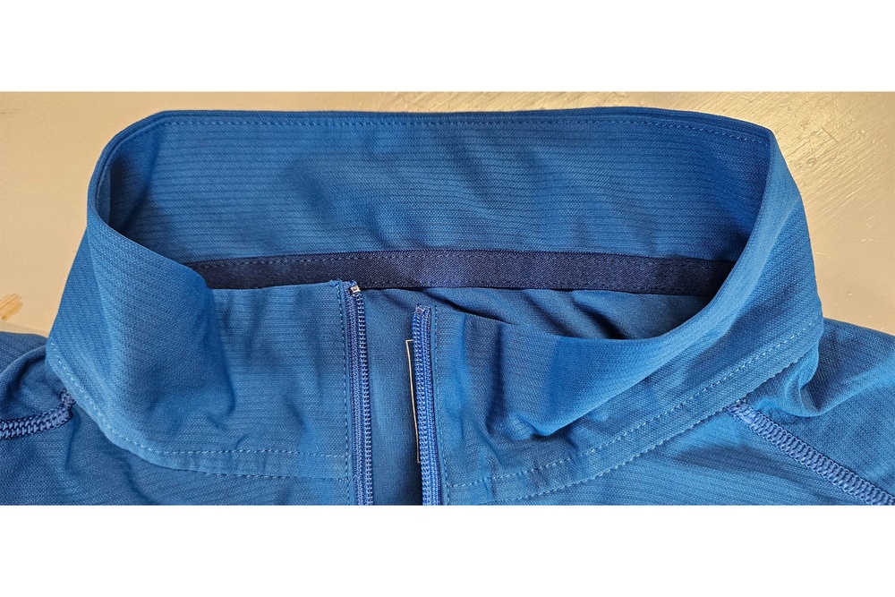 Add some colour to your base layer wardrobe with this zip-up (Tamara Hinson/The Independent)