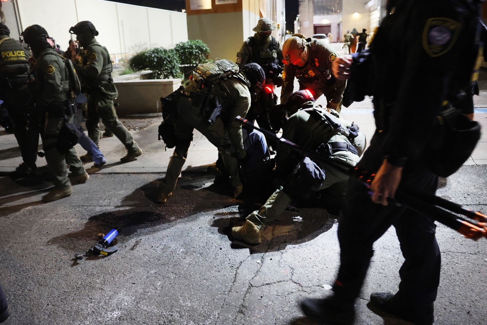 Federal agents, including members of the Department of Homeland Security, Border Patrol, and the police, arrest a protester outside a downtown U.S. Immigration and Customs Enforcement (ICE) facility on October 05, 2025 in Portland (Getty Images)