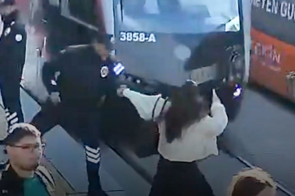 Watch: Security guard saves pedestrian from oncoming tram in dramatic ...