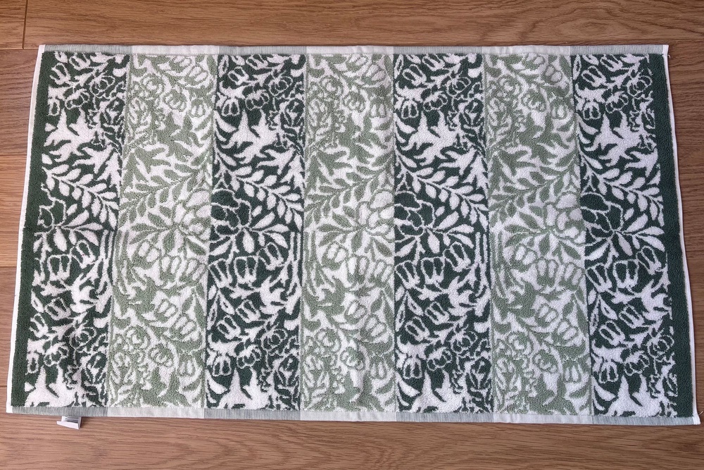 The sage green easily elevates a bathroom space (Siobhan Grogan/The Independent)