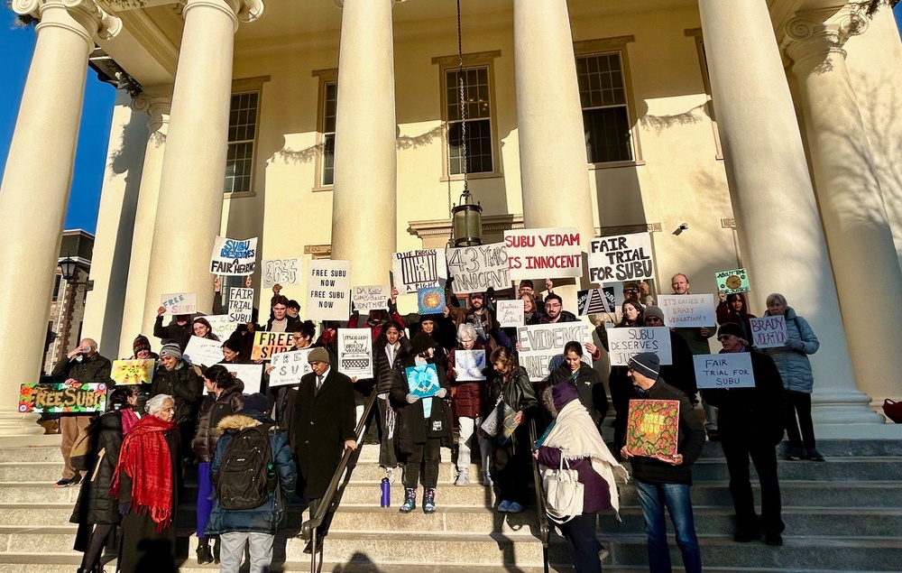 Supporters of Subramanyam ‘Subu’ Vedam demonstrate outside the Centre County Courthouse
