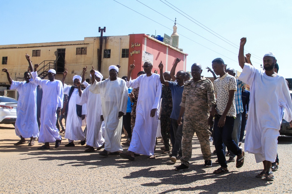 Local residents take part in a demonstration in Omdurman on October 31, 2025, to protest against the Rapid Support Forces' reported atrocities in El-Fasher in western Sudan (AFP via Getty Images)
