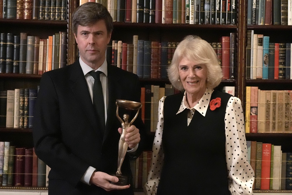 Szalay with Queen Camilla at the Booker Prize reception last year (PA)