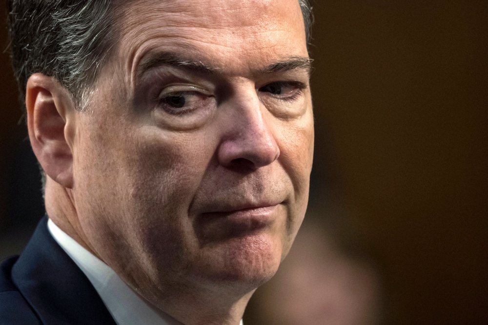 The Department of Justice has again indicted ex-FBI director James Comey, this time over a seashell picture on Instagram (AP)