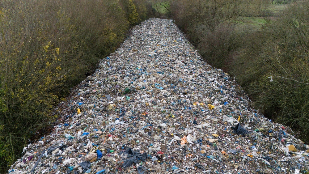 The 150m long pile of rubbish that has been illegally dumped beside the A34 and near the River Cherwell in Kidlington (PA)