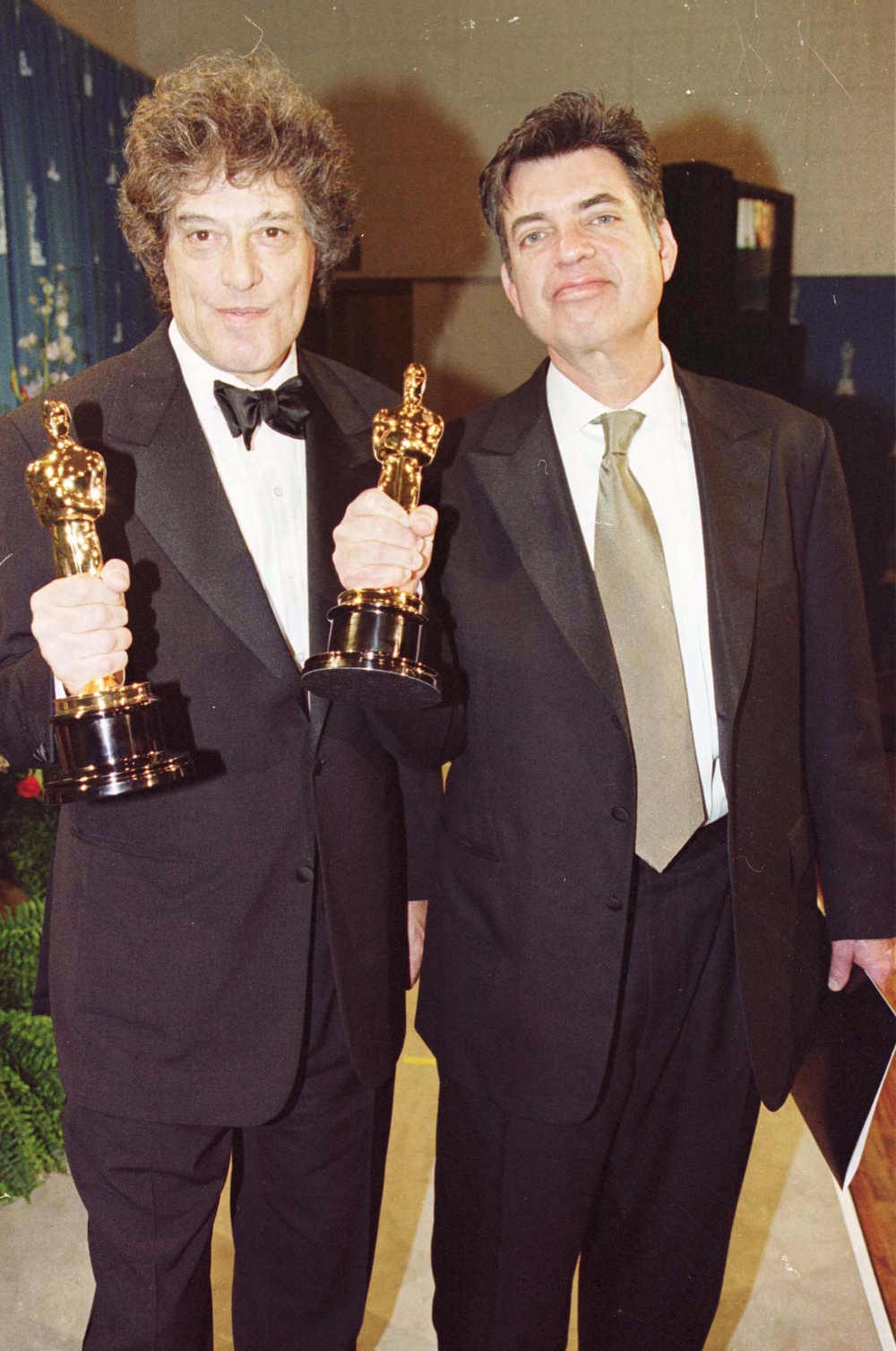 Stoppard and Shakespeare in Love co-writer Marc Norman with their Academy Awards in 1999 (Peter Jordan/PA Wire)