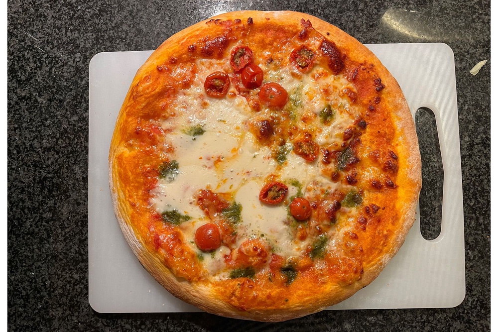 We loved the tangy cherry tomatoes on this Co-op pizza (Alice Reynolds/The Independent)