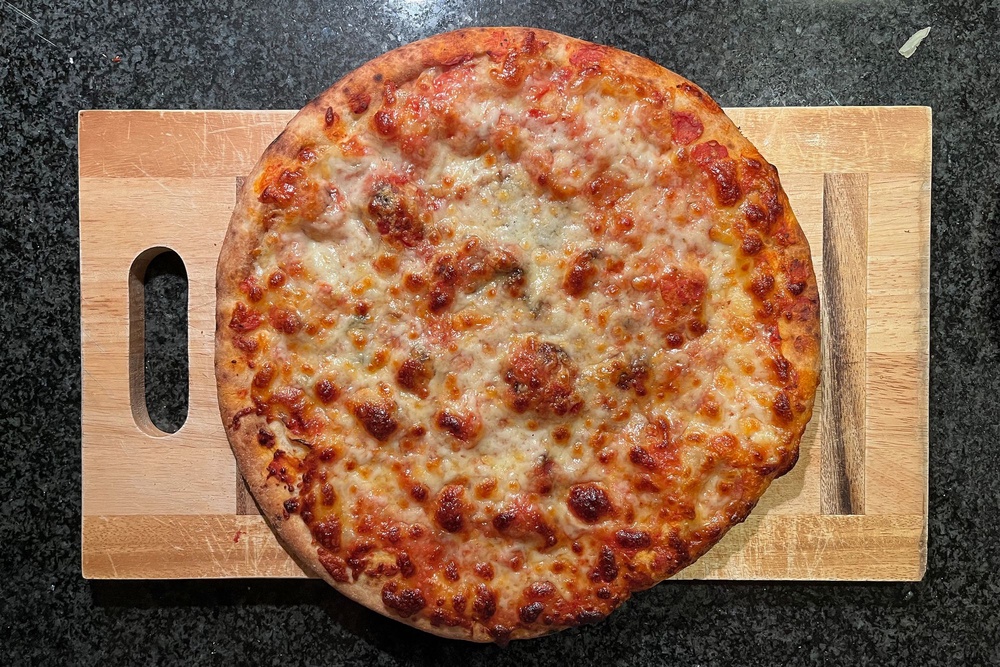 The cheese crisped-up well in the oven (Alice Reynolds/The Independent)