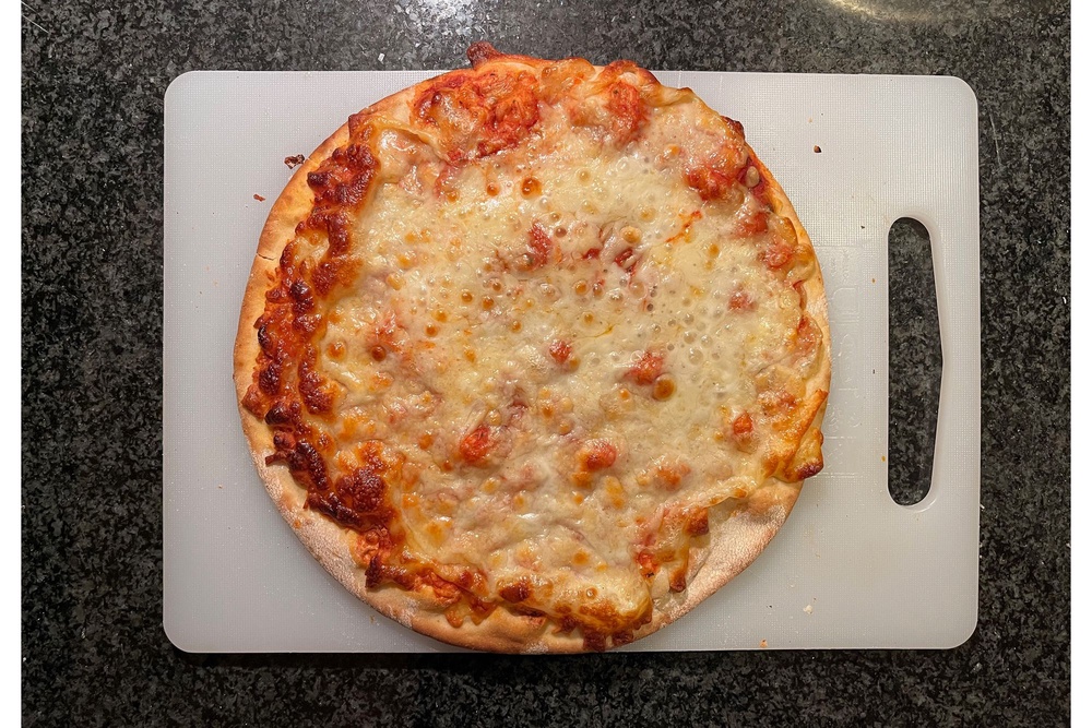 There was plenty of cheese atop this Sainsbury’s pizza (Alice Reynolds/The Independent)