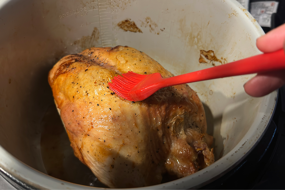 Basting the meat helps to add flavour and ensures it stays moist (Rachael Penn/The Independent)