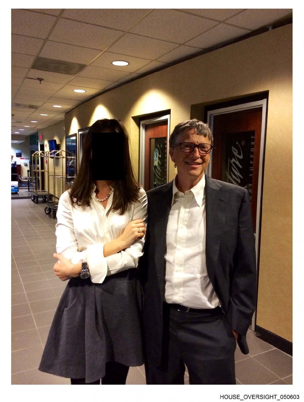 Gates appears with a woman, whose identity has been obscured, in this image from the Epstein estate released by the committee (House Oversight Committee)