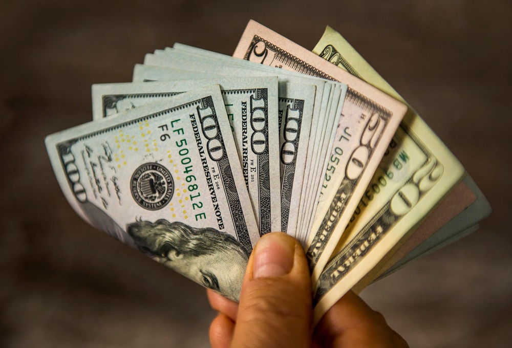 Earning around a salary of around $100,000 qualifies Americans as lower-middle class in 12 states, an analysis found (Getty/iStock)