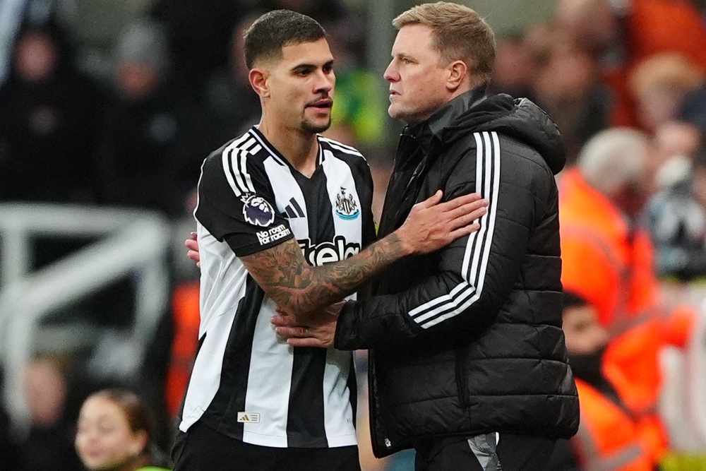 Newcastle manager Eddie Howe (right) appreciates ‘special’ skipper Bruno Guimaraes (Mike Egerton/PA) (PA Archive)