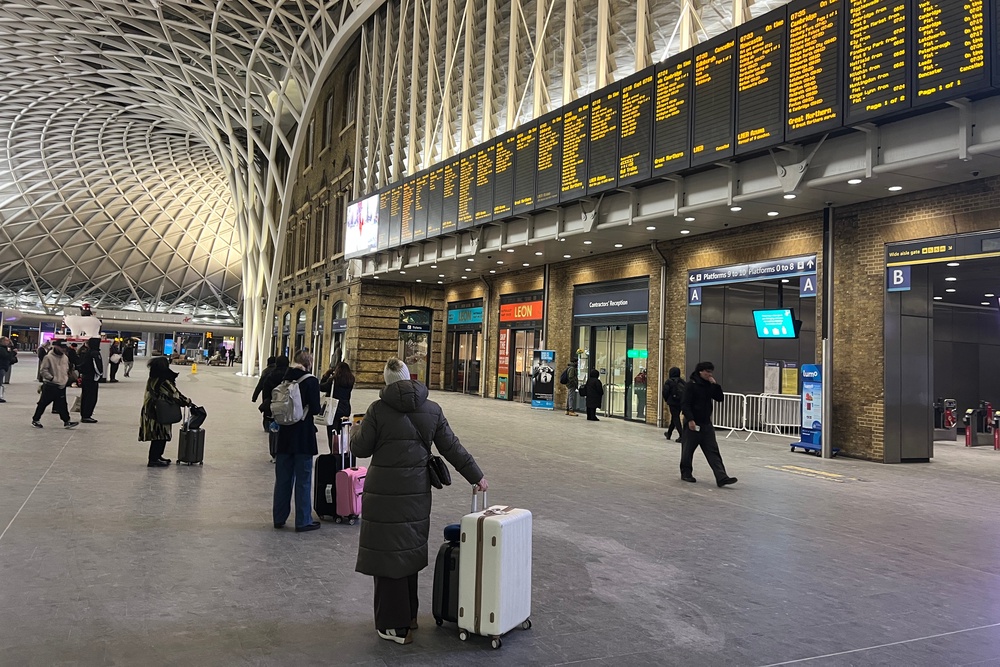 Cross purposes: Passengers at London King's Cross station waiting for delayed trains to Scotland (Simon Calder)