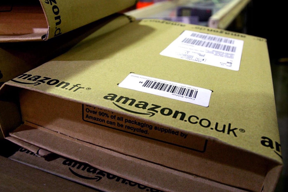 The online giant employs about 75,000 people in the UK in roles such warehouse workers, delivery drivers, and corporate and technology positions, making it one of the ten biggest private employers (PA Archive)