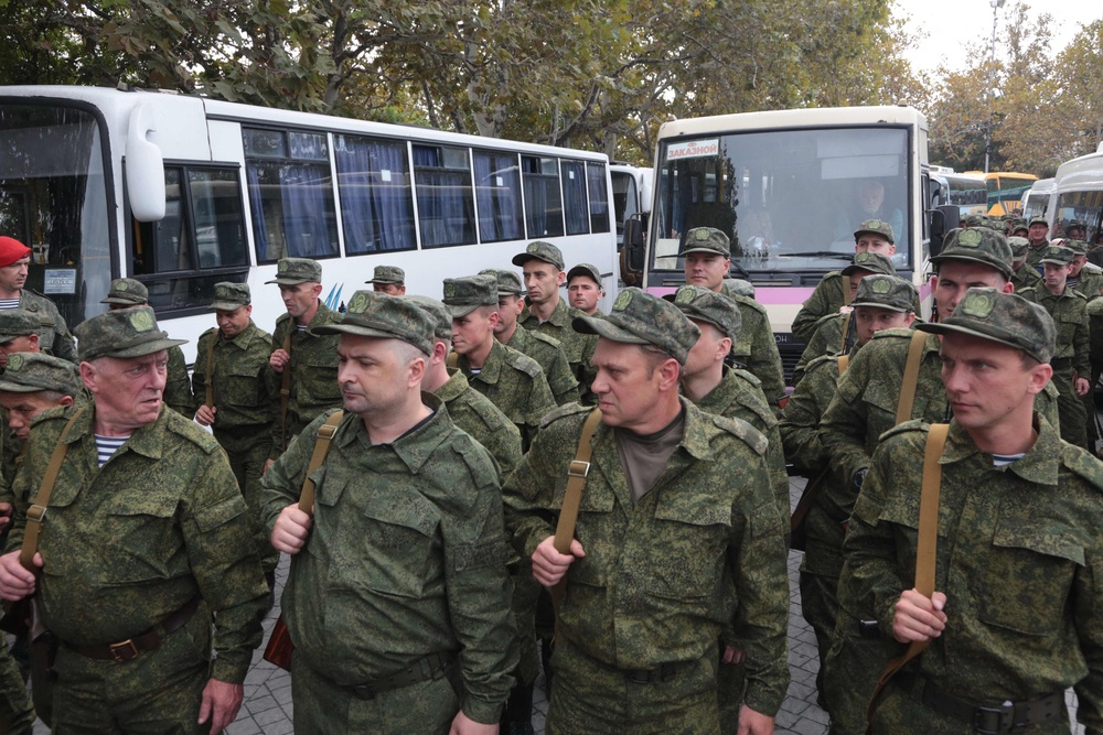 Russian reservists depart for military bases during mobilisation of troops, in Sevastopol (AFP/Getty)