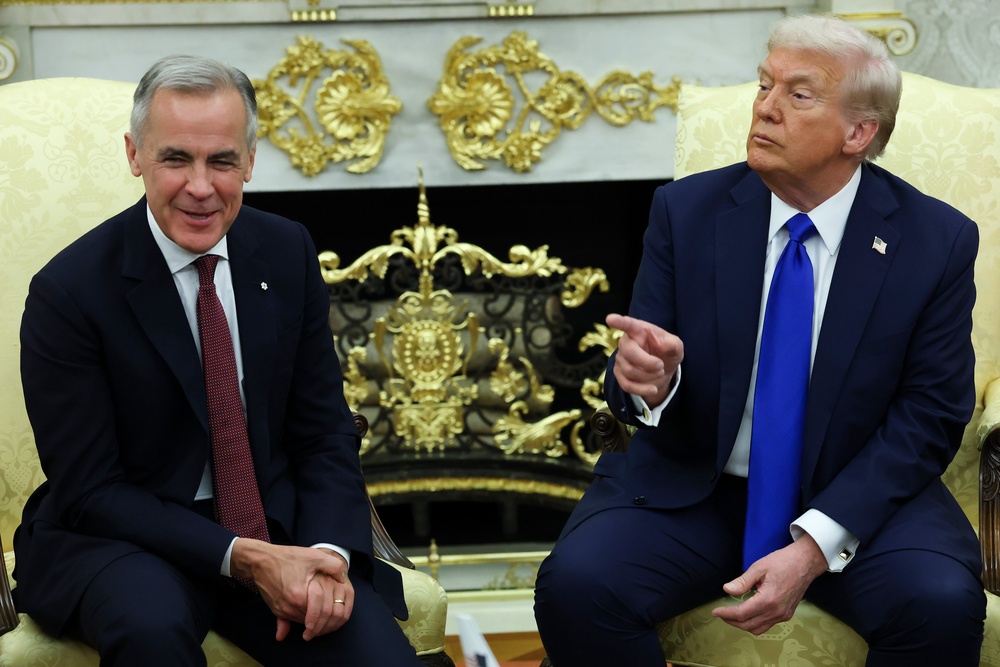 Trump  speaks to reporters alongside Canadian Prime Minister Mark Carney in the Oval Office of the White House on October 07, 2025, in Washington, DC (Getty Images)