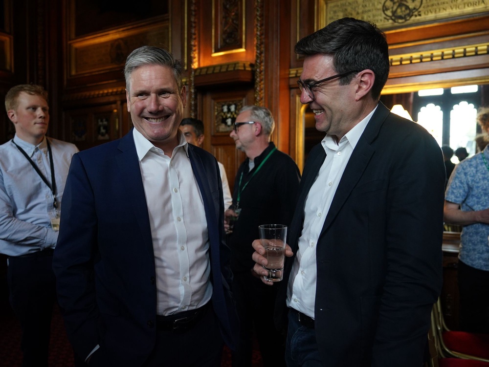 Then-leader of the opposition, Sir Keir Starmer, and Manchester mayor Mr Burnham pictured in 2022 (PA)