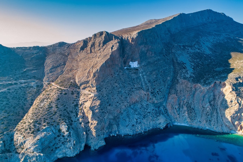 The Panagia Hozovitissa monastery, pictured, on Amorgos is perched 1,000 feet up on the side of a cliff (Getty/iStock)