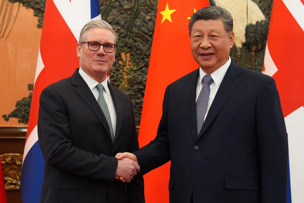 Prime Minister Sir Keir Starmer shakes hands with Chinese president Xi Jinping (Carl Court/PA) (PA Wire)