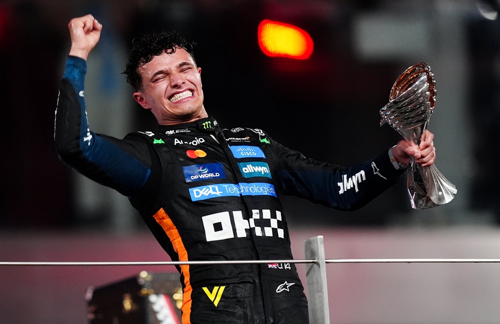 Lando Norris celebrates winning the F1 world championship in Abu Dhabi last year (PA Wire)
