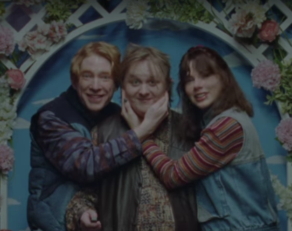 Taylor Swift with Domhall Gleeson (left) and Lewis Capaldi in the 'Opalite' music video (Republic Records/Universal Music Group)