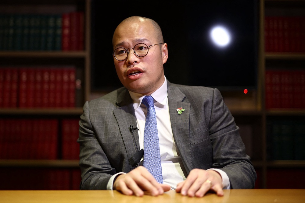 Sebastien Lai told The Independent he was ‘incredibly proud’ of his father for sticking to his principles (AFP/Getty)