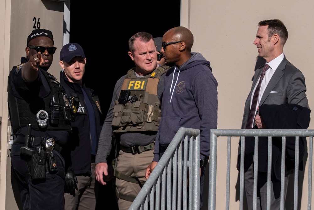 FBI agents are seen at the Fulton County Election Hub and Operation Center, Wednesday, Jan. 28, 2026, in Union City, Ga, near Atlanta (AP)