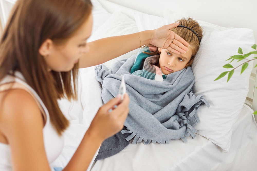 A high temperature can be a sign of measles. (Alamy/PA)