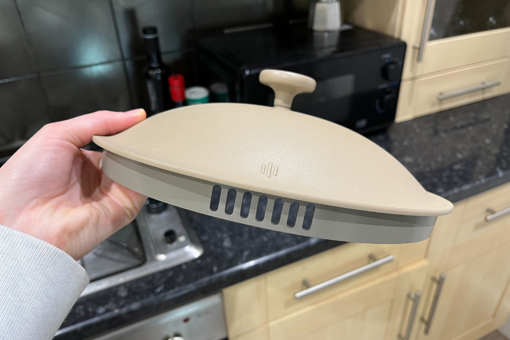 Slots built into the lid aim to replace your sieve or colander (Alice Reynolds/The Independent)