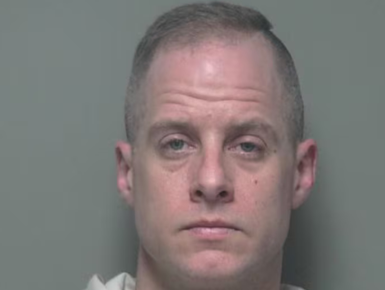 Flynn (pictured) has pleaded not guilty to charges of aggravated murder, murder, felonious assault and tampering with evidence (Miami County Jail)
