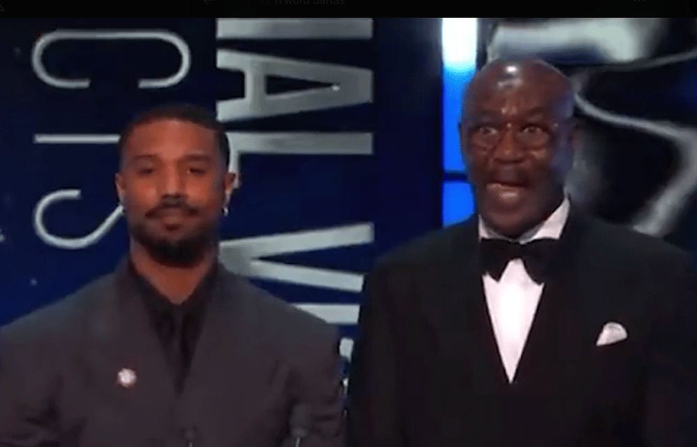 The n-word was used while Michael B Jordan and Delroy Lindo were on stage (BBC)