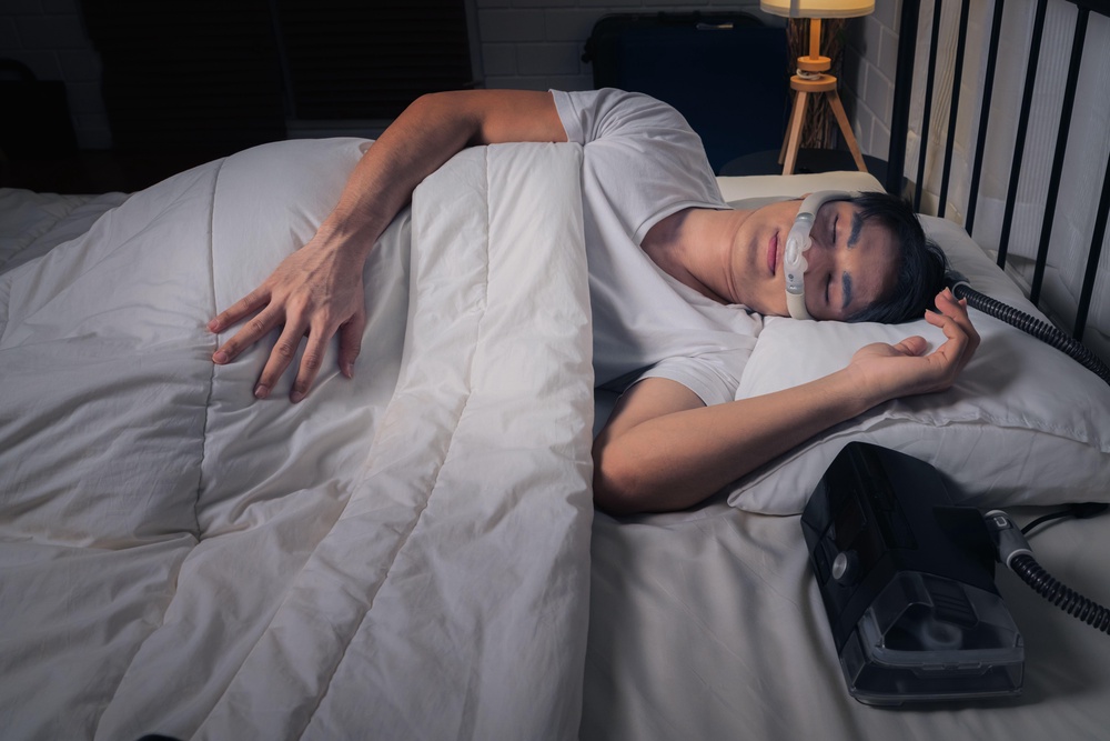Wearing a CPAP machine in bed can stop snoring (Alamy/PA)