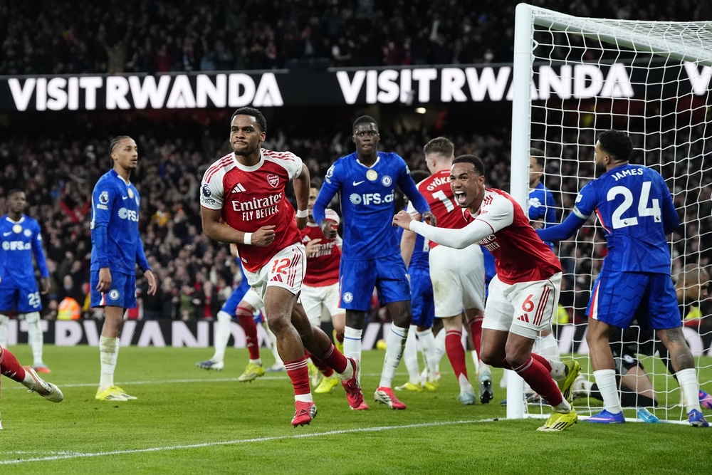 Arsenal’s Jurrien Timber (centre left) celebrates after scoring the winner against Chelsea last season (PA Wire)