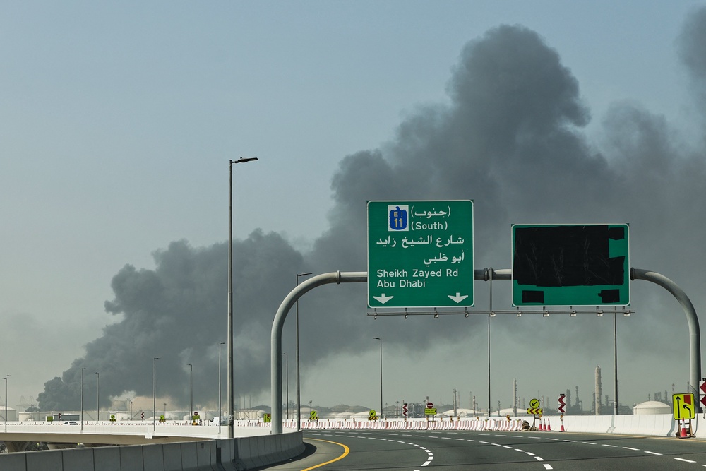 A plume of smoke rises from the port of Jebel Ali following a reported Iranian strike in Dubai (AFP via Getty)