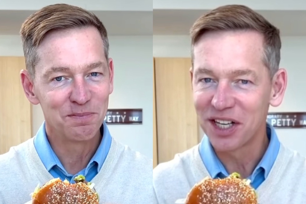 McDonald’s CEO Chris Kempczinski (pictured here trying the company’s Big Arch burger in March) earned $20.6 million in 2025, or about two-thirds the salary of Starbucks CEO Brian Niccol (Instagram/@chrisk_mcd)