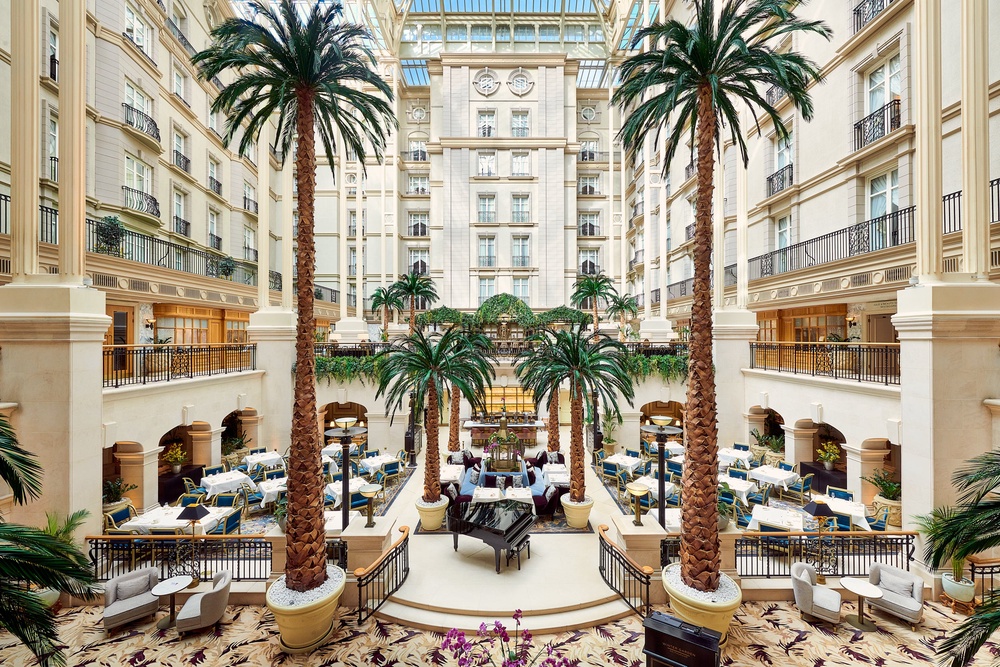 The Winter Garden Restaurant is flanked by towering palm trees (The Landmark London)