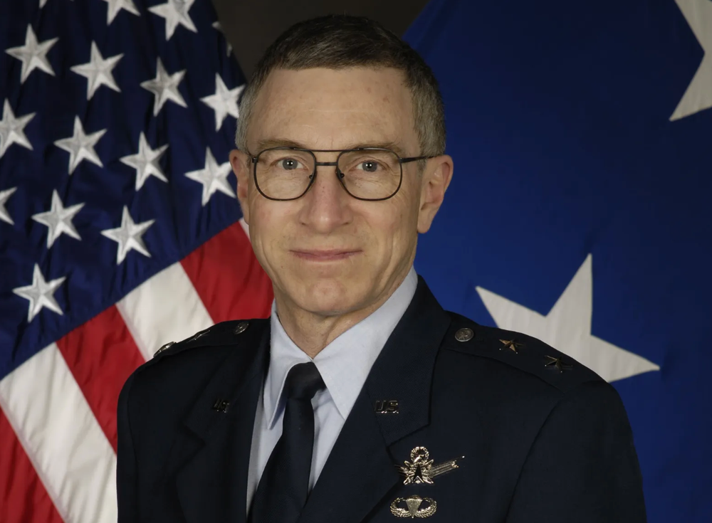 Retired Air Force general William Neil McCasland is at the center of the conspiracy theories due to his former role leading the Air Force Research Laboratory at Wright-Patterson Air Force Base in Greene County, Ohio—a site which conspiracy theorists have long linked to the 1947 Roswell incident (U.S. Air Force)