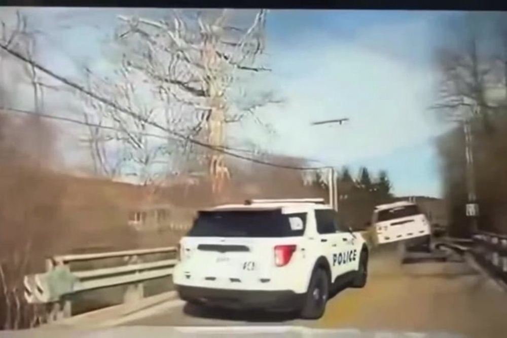 Police SUV flipped after landing on suspect’s flatbed truck in wild car ...
