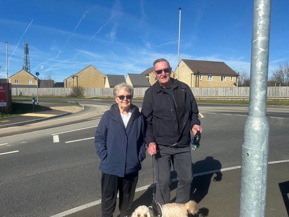 Carol Richardson with her partner Peter Eaton. The couple moved to Swindon from Reading, and say too many homes are being built without consideration given to infrastructure (The Independent)